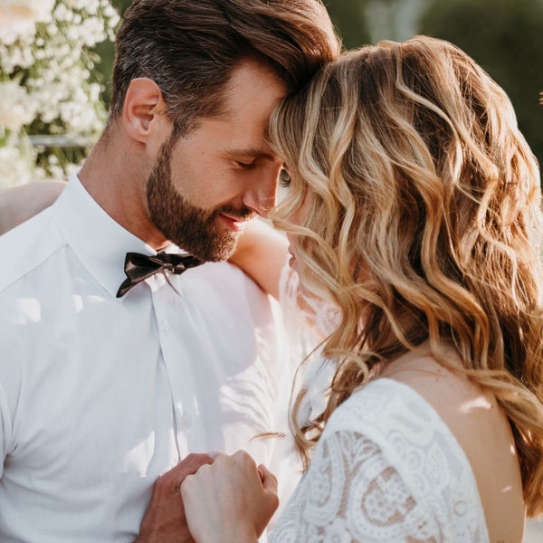 bride-and-groom-having-their-wedding-at-the-beach.jpg